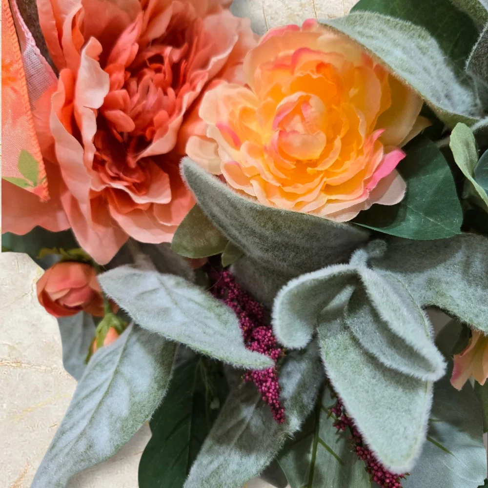 Peach and Pink Holiday Wreath with Festive Ribbon